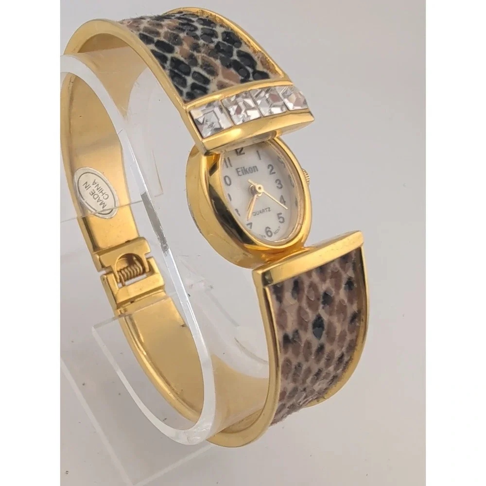 Eikon Women Watch 17mm Hidden Dial Gold Case Snakeskin Cuff 6.5
